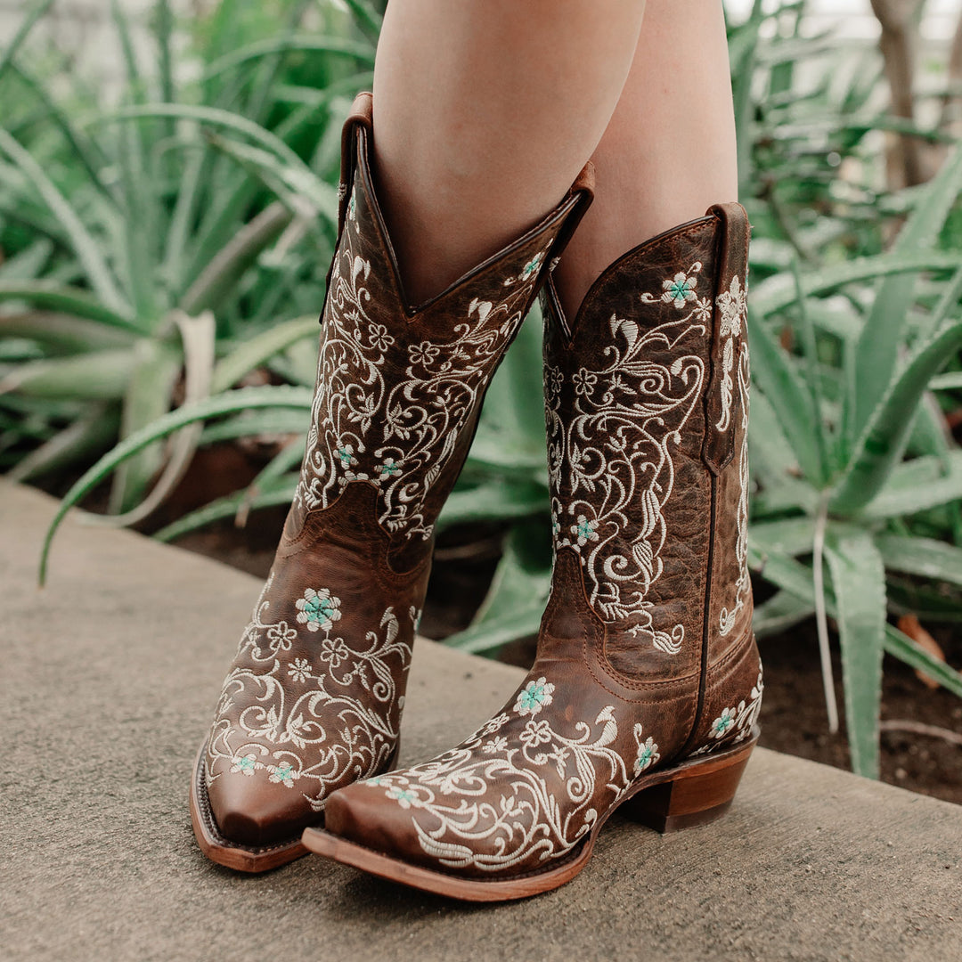 Floral embroidered western boots on sale